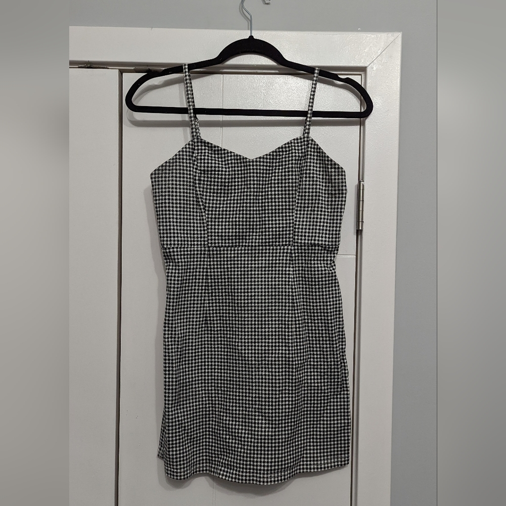 Plaid mini dress. Fits really well and very versatile, can be formal or casual.
